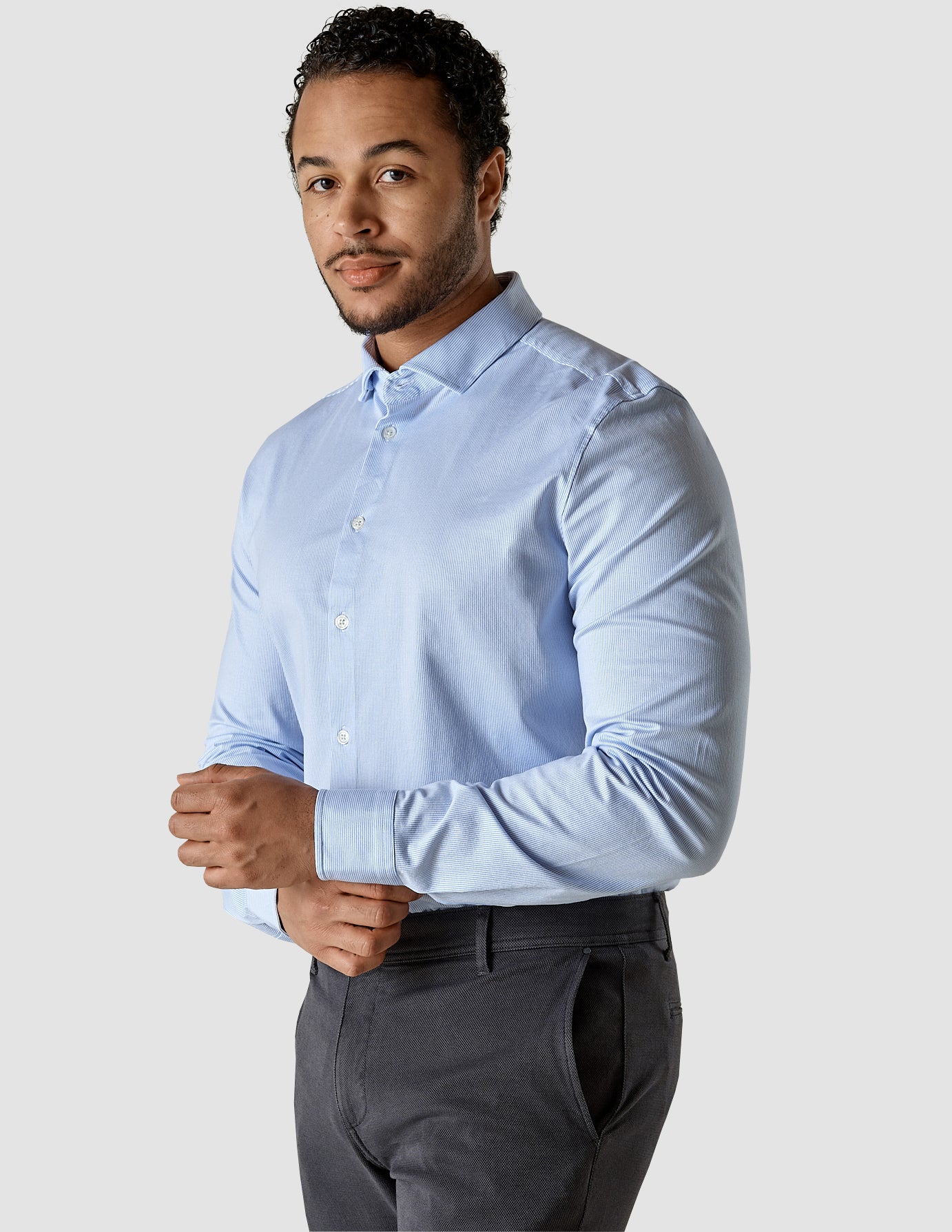 Model from the front wearing a Classic Shirt Light Blue Stripes